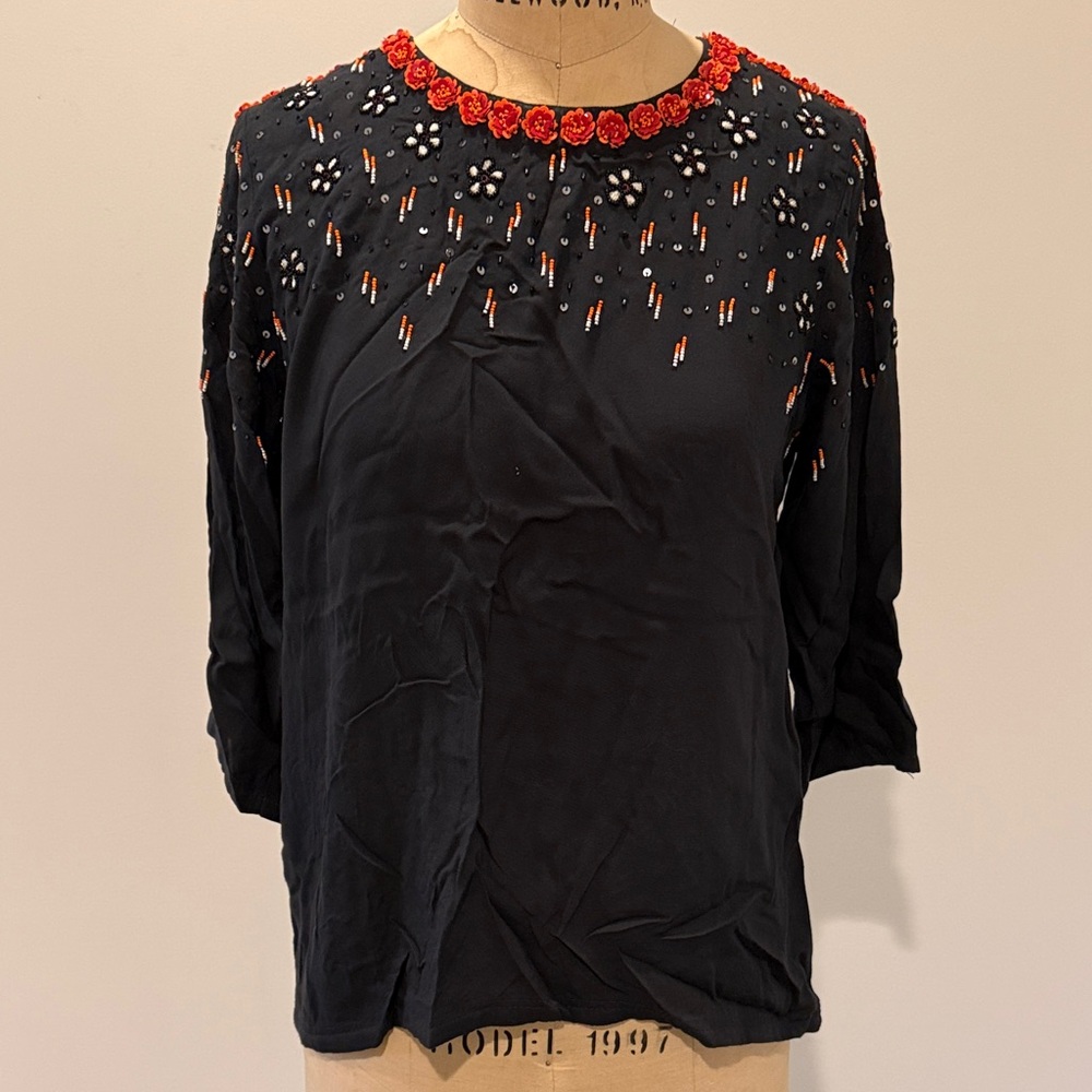 Embellished Black Top with Red Accents